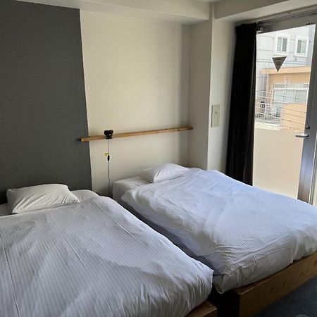 Santiago Guesthouse Hiroshima Bagian luar foto