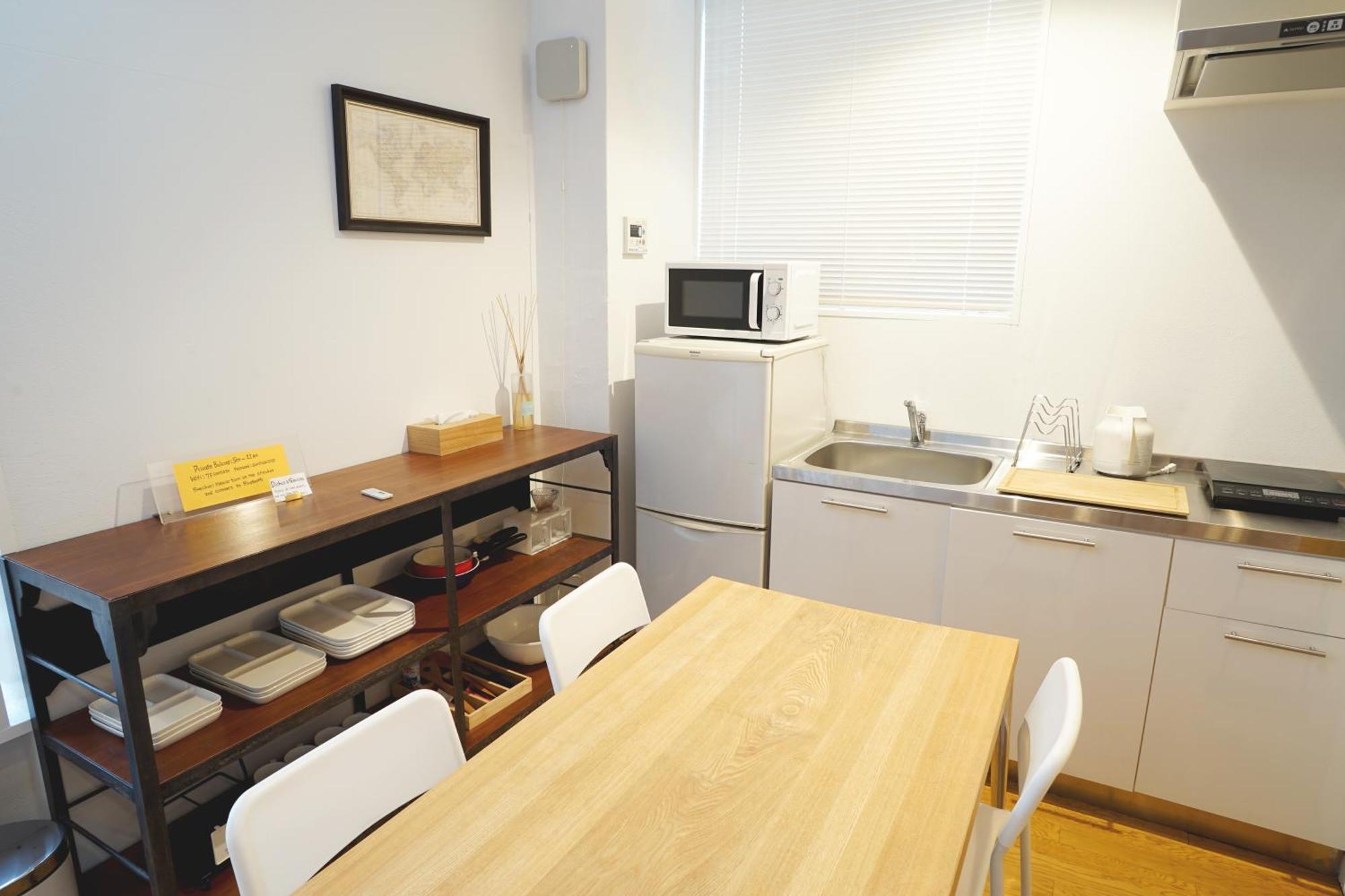 Santiago Guesthouse Hiroshima Ruang foto