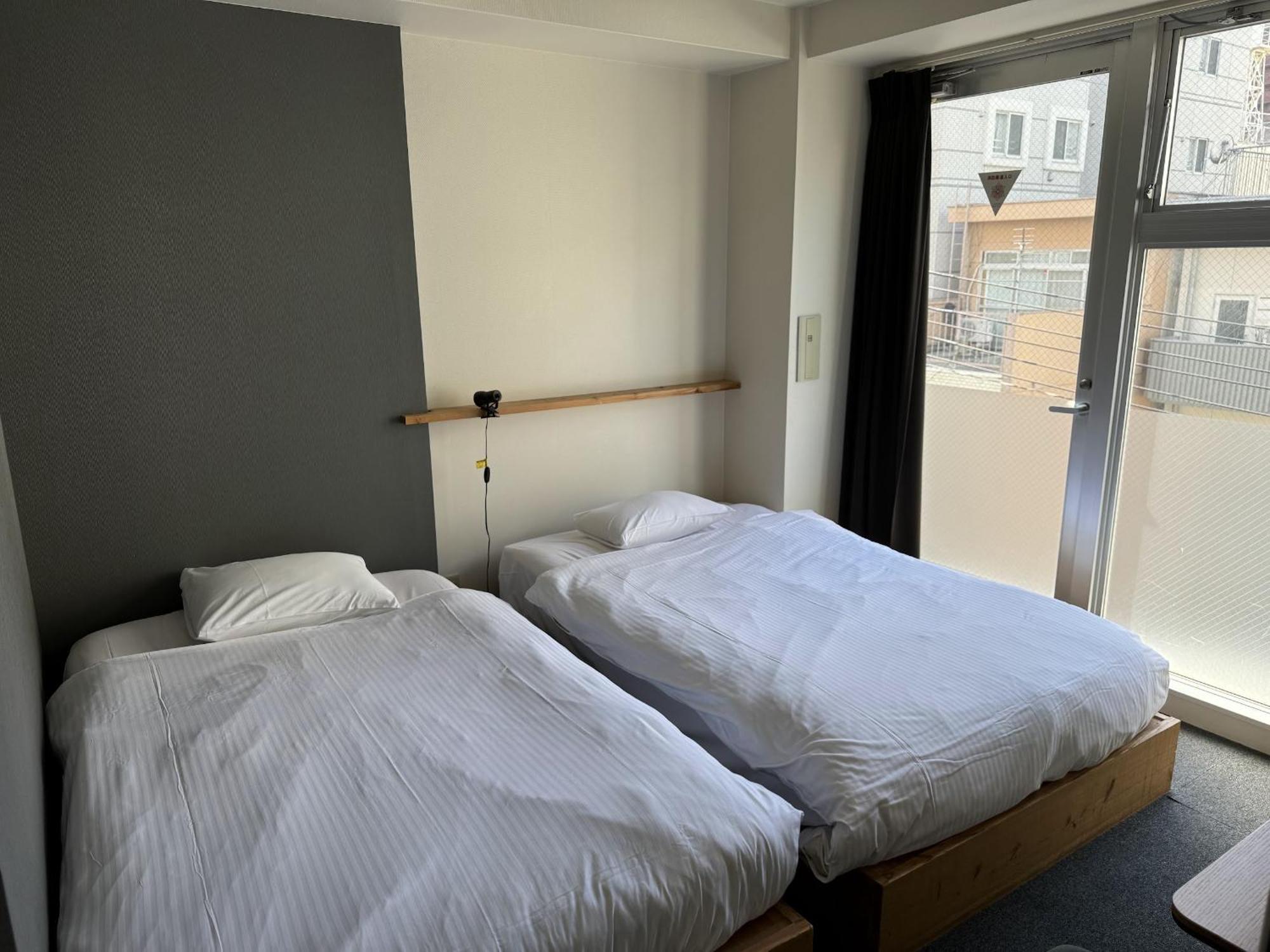 Santiago Guesthouse Hiroshima Bagian luar foto