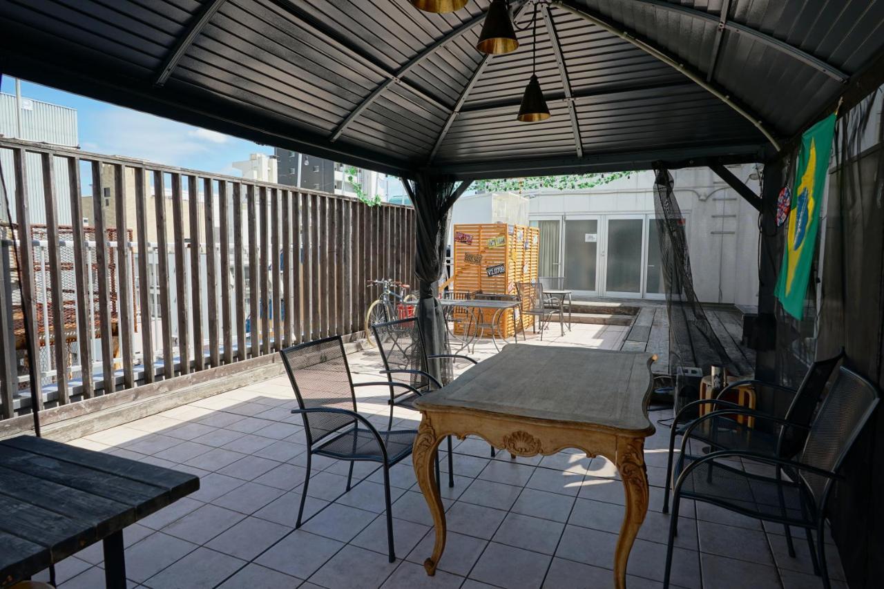 Santiago Guesthouse Hiroshima Bagian luar foto
